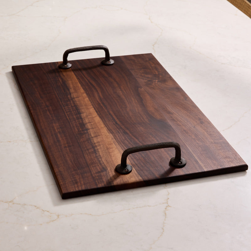 Thin rectangular walnut cutting board with smooth edges, crafted from safest cutting board material for modern kitchens.