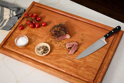 Cherry custom wood cutting boards with juice groove, best chopping board design for meat prep and non toxic cutting board.