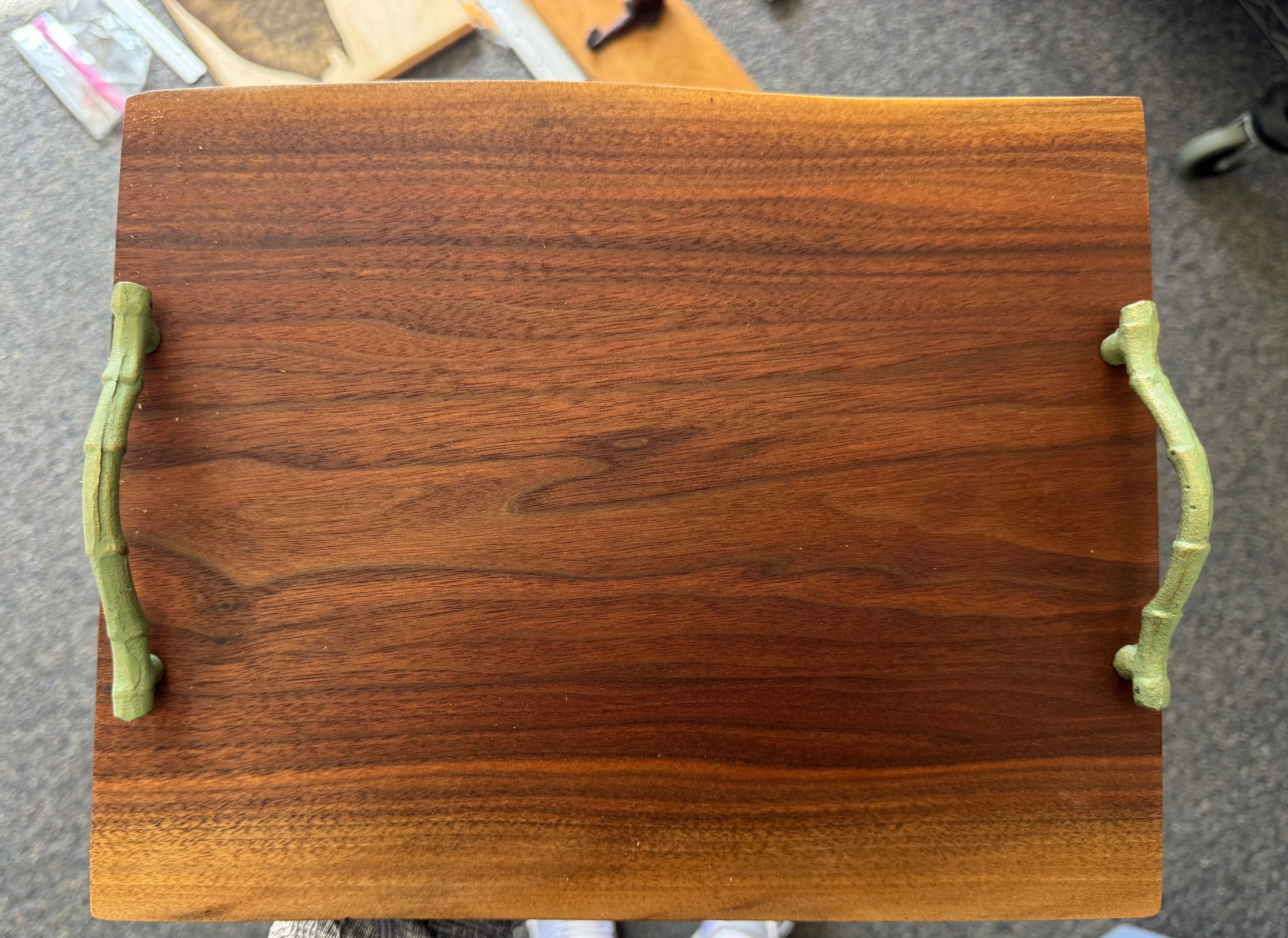 Wooden serving tray with handles by Refined Surroundings, showcasing elegant grain, balanced size, and versatile decor use for hosting.