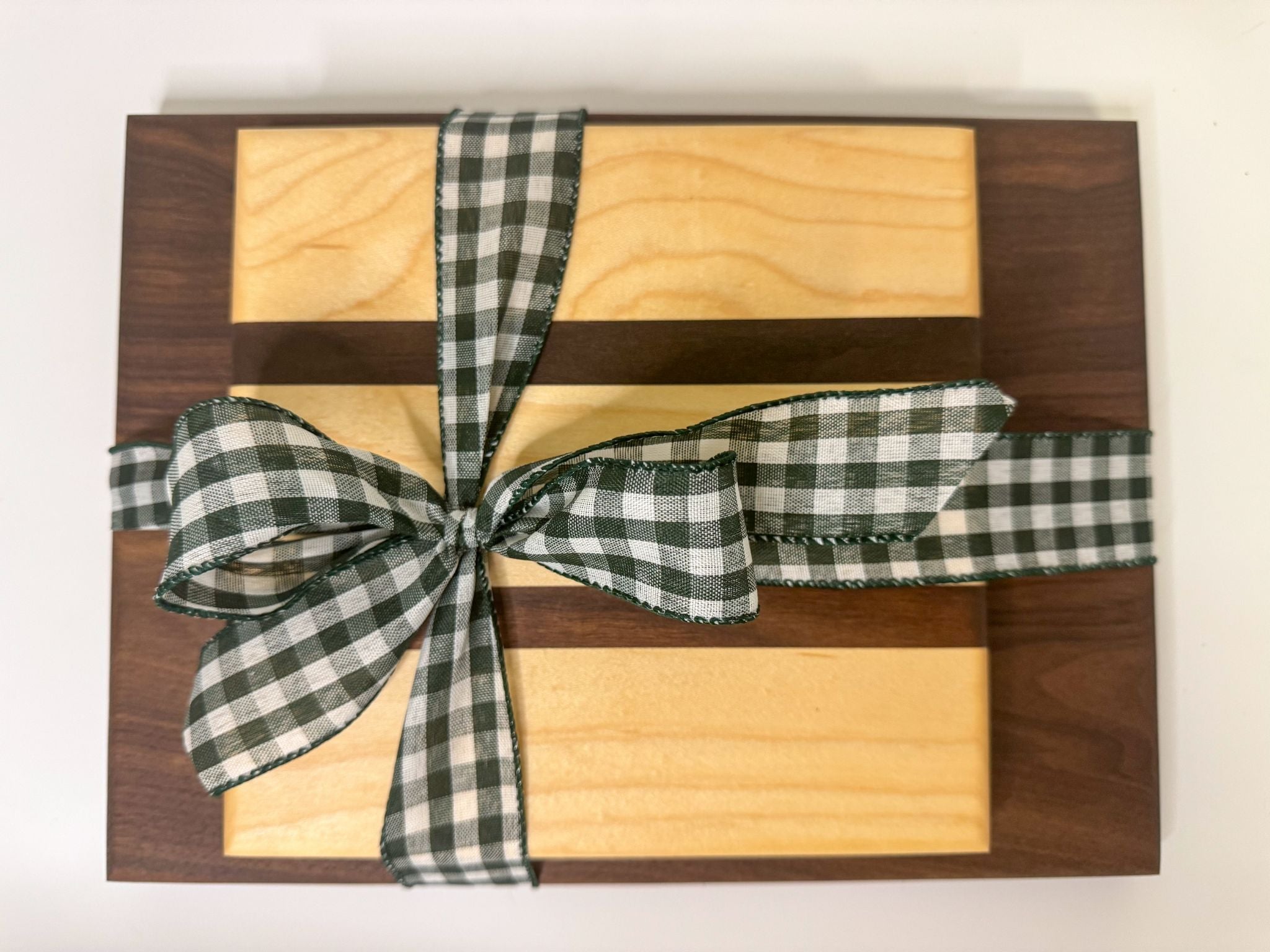 Maple wood cutting board wrapped with ribbon, unique cutting board designs perfect as a hostess gift or wood decor.