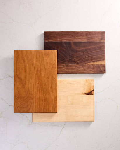 Best wooden chopping board set in walnut cutting board, maple wood cutting board, and cherry wood for unique kitchen use.